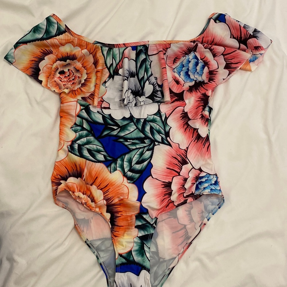 Off the shoulder floral one piece bathing suit. Extremely flattering!